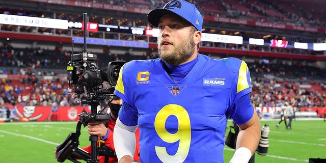 Matthew Stafford #9 of the Los Angeles Rams kicks off the field after defeating the Tampa Bay Buccaneers 30-27 in an NFL playoff game at Raymond James Stadium on January 23, 2022 in Tampa, Florida.