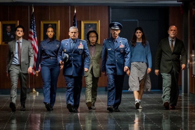 (l) Ben Schwartz as Tony Scarabeducci;  Tawny Newsome as Angela Ali;  Steve Carell as General Mark Nerd;  Jimmy Oo Yang as Dr.  Chan Kaifang;  Don Lake as Brigadier General Bradley Gregory;  Diana Silvers as Erin Nerd;  and John Malkovich as Dr. Adrian Mallory.