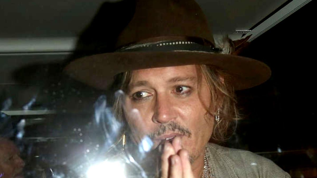 Johnny Depp Looks Exhausted As He Waves At Fans From The Tour Bus After A Gig With Jeff Beck In Munich
